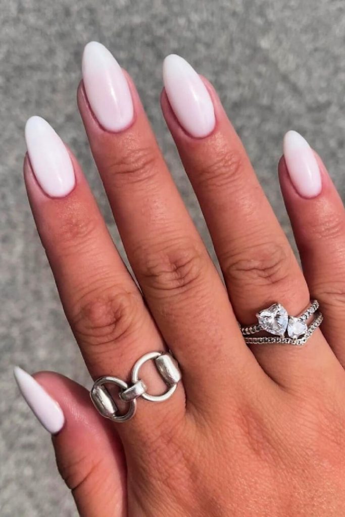 Clean white nails with pink undertone