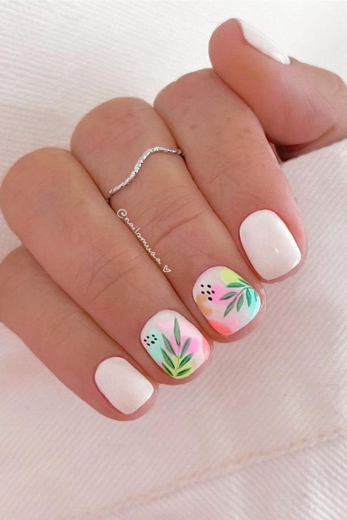 summer nails design inspiration featuring neon blobs with foliage