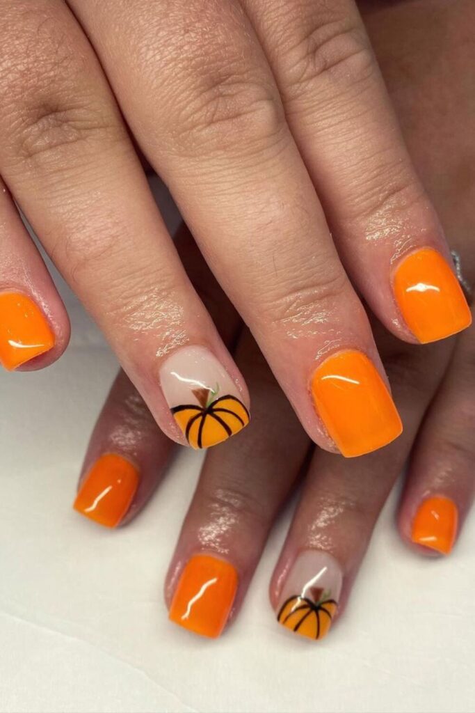 Orange Nails with Accent Pumpkin Tips