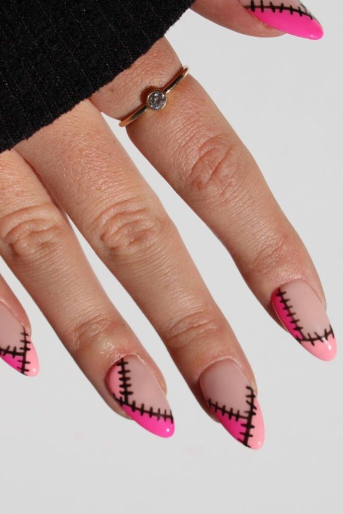 stitched - pink halloween nails